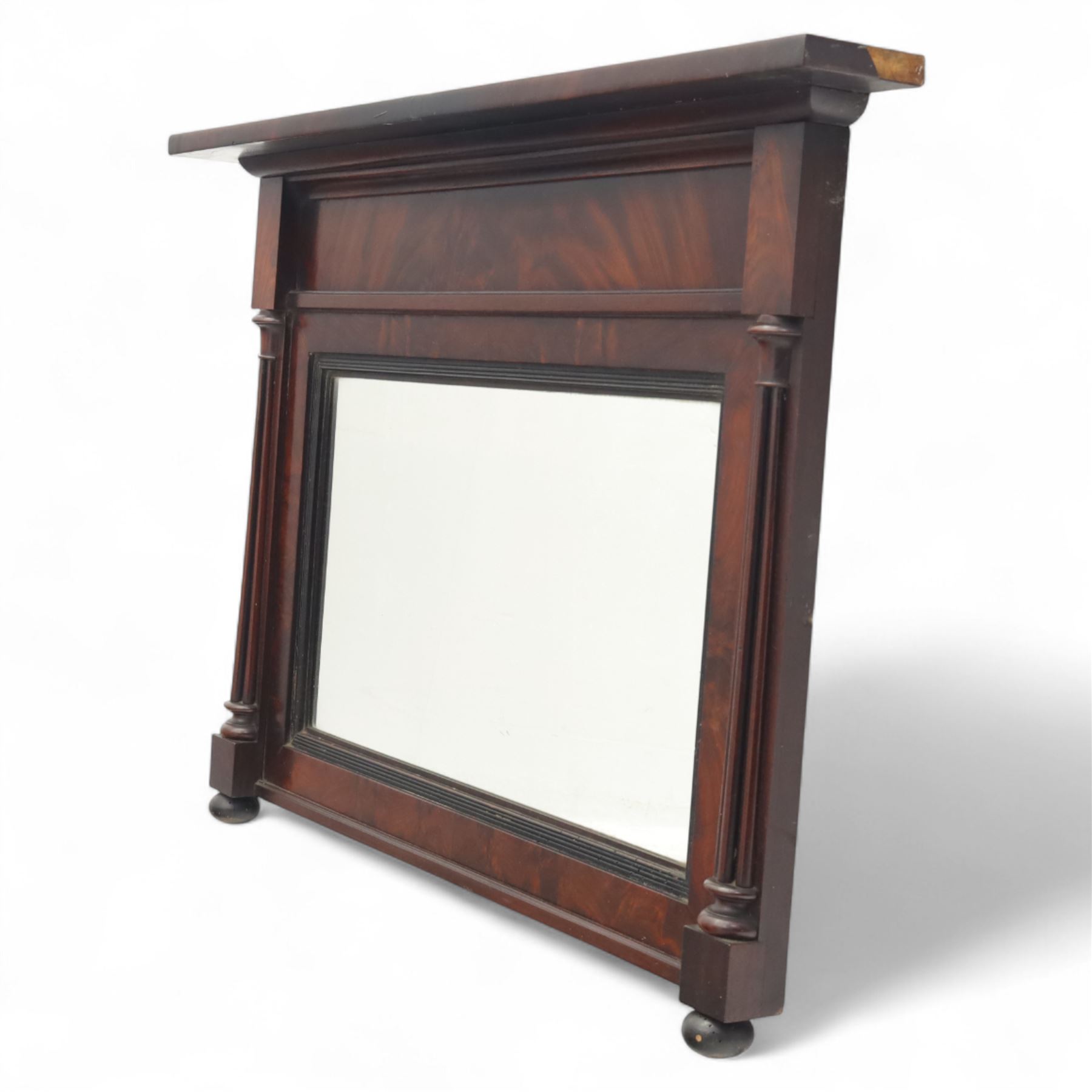 Two mahogany wall hanging items, comprising a French mahogany overmantel mirror with reeded uprights and moulded cornice (H 68cm, W 97cm, D 10cm), together with a mahogany wall shelf unit with three tiers and fretwork sides, the lower section fitted with three small drawers (H 95cm, W 63cm, D 18cm) (2)