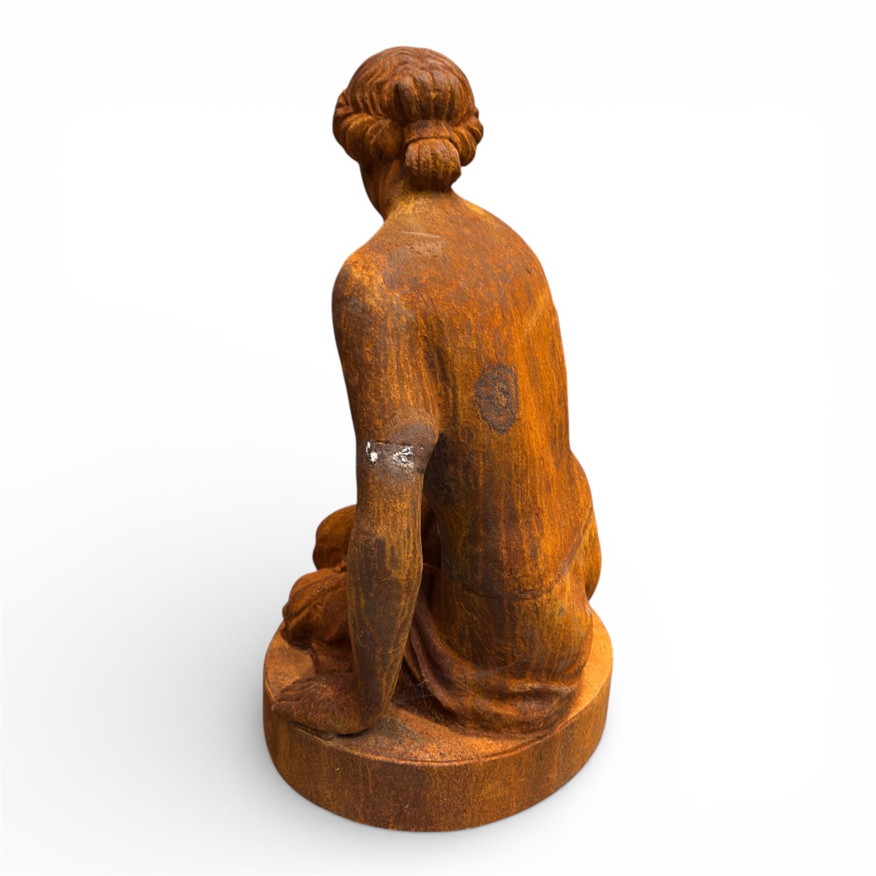 Victorian design cast iron semi-nude seated lady, on oval plinth base