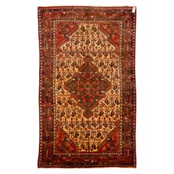 North West Persian Malayer hand-knotted rug, ivory field with central stepped lozenge meda...