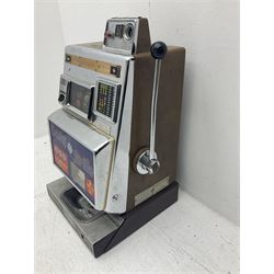 Aristocrat Nevada Lucky Strike one-armed bandit arcade machine, circa 1964, light-up display in aluminium and stainless steel case, with keys, H72cm 