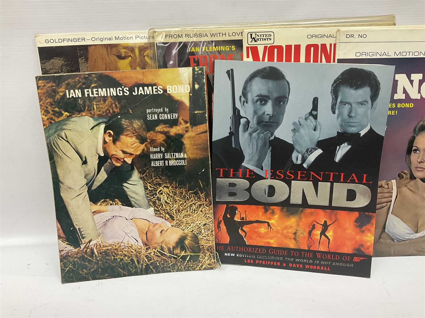 Sixteen James Bond books, including Live and Let Die, The Spy who Loved Me, Four Your Eyes Only, Moonraker etc, together with various 007 ephemera, soundtrack vinyls etc 