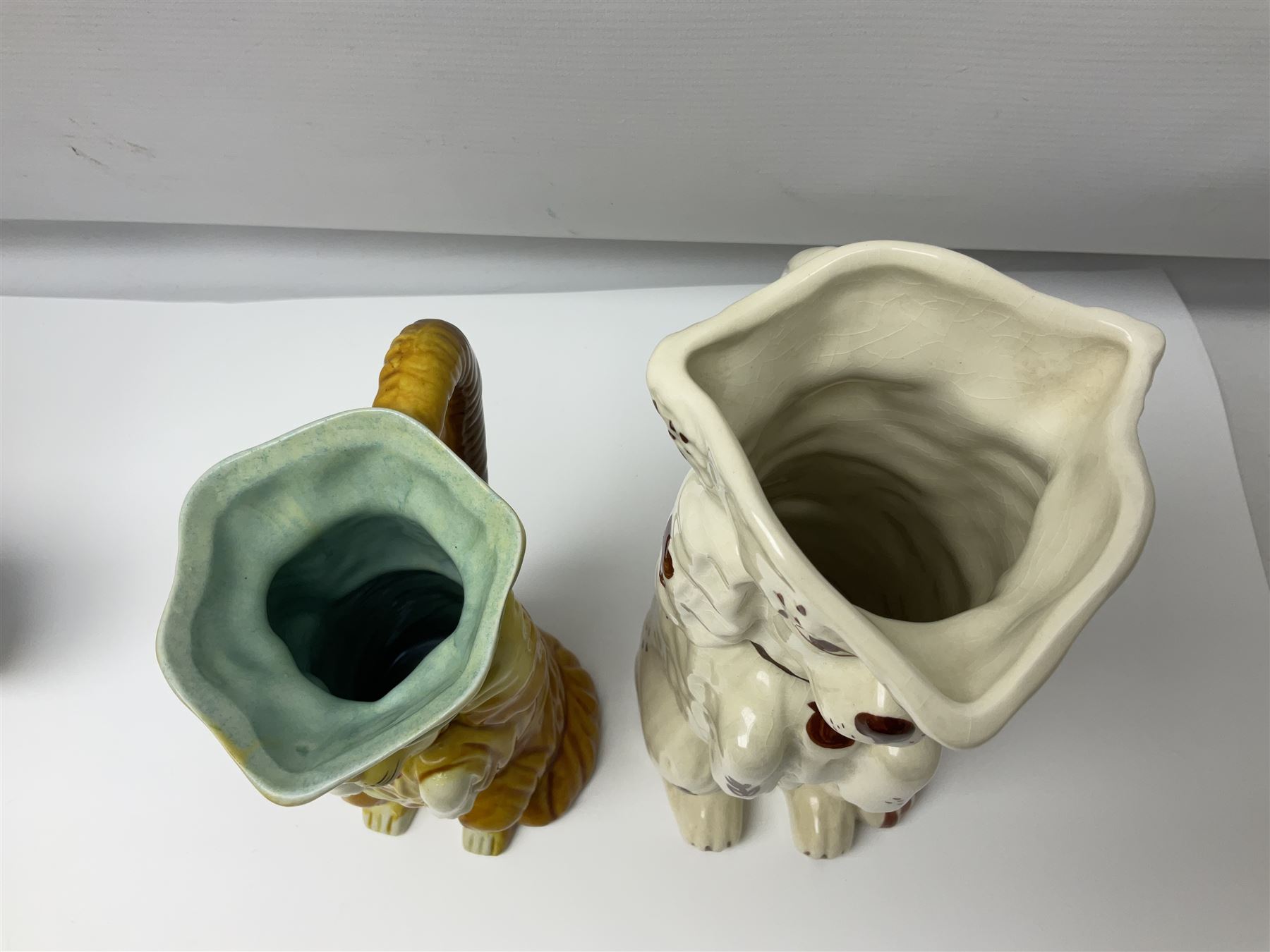 Three Pairs of Staffordshire style dogs, together with two Staffordshire style jugs, largest example H30cm 