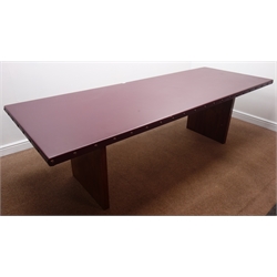  Large rectangular maroon leather top dining table, brass studs, walnut solid end supports joined by single stretcher (276cm x 100cm, H76cm), and ten leather high back chairs, tapering supports  