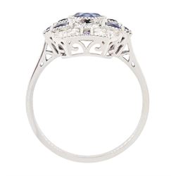 Platinum sapphire and diamond panel ring, milgrain set with round and calibre cut sapphires and round cut diamonds, stamped Pt 950, total sapphire weight 0.87 carat, total diamond weight 0.46 carat