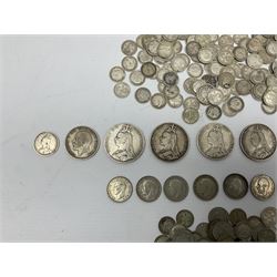 Approximately 400 grams of pre 1920 Great British silver coins including four Queen Victoria crowns, two double florins dated 1889 and 1890, 1887 half crown, various threepence pieces etc and approximately 130 grams of pre 1947 silver coins
