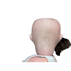 Two German porcelain dolls with moveable limbs