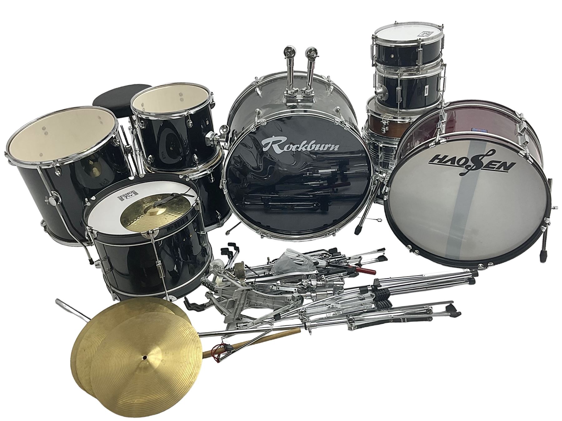 Rockburn eight-piece black drum kit with bass drum, floor tom and five other toms and snare drum; together with two other snare drums; Haosen bass drum; four cymbals; various stands, foot pedals, stool, tri-angle, drum sticks etc