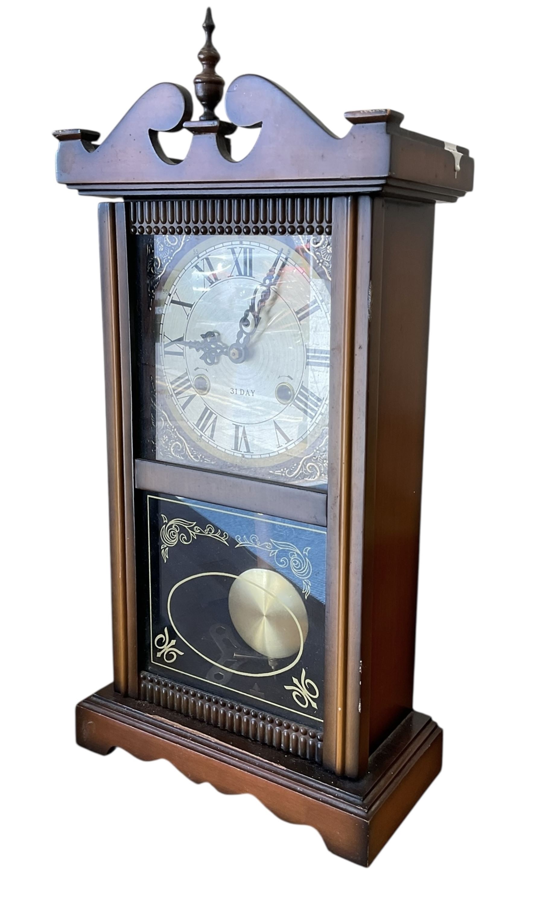 20th century- 31-day spring driven mantle/wall clock striking the hours on a gong.