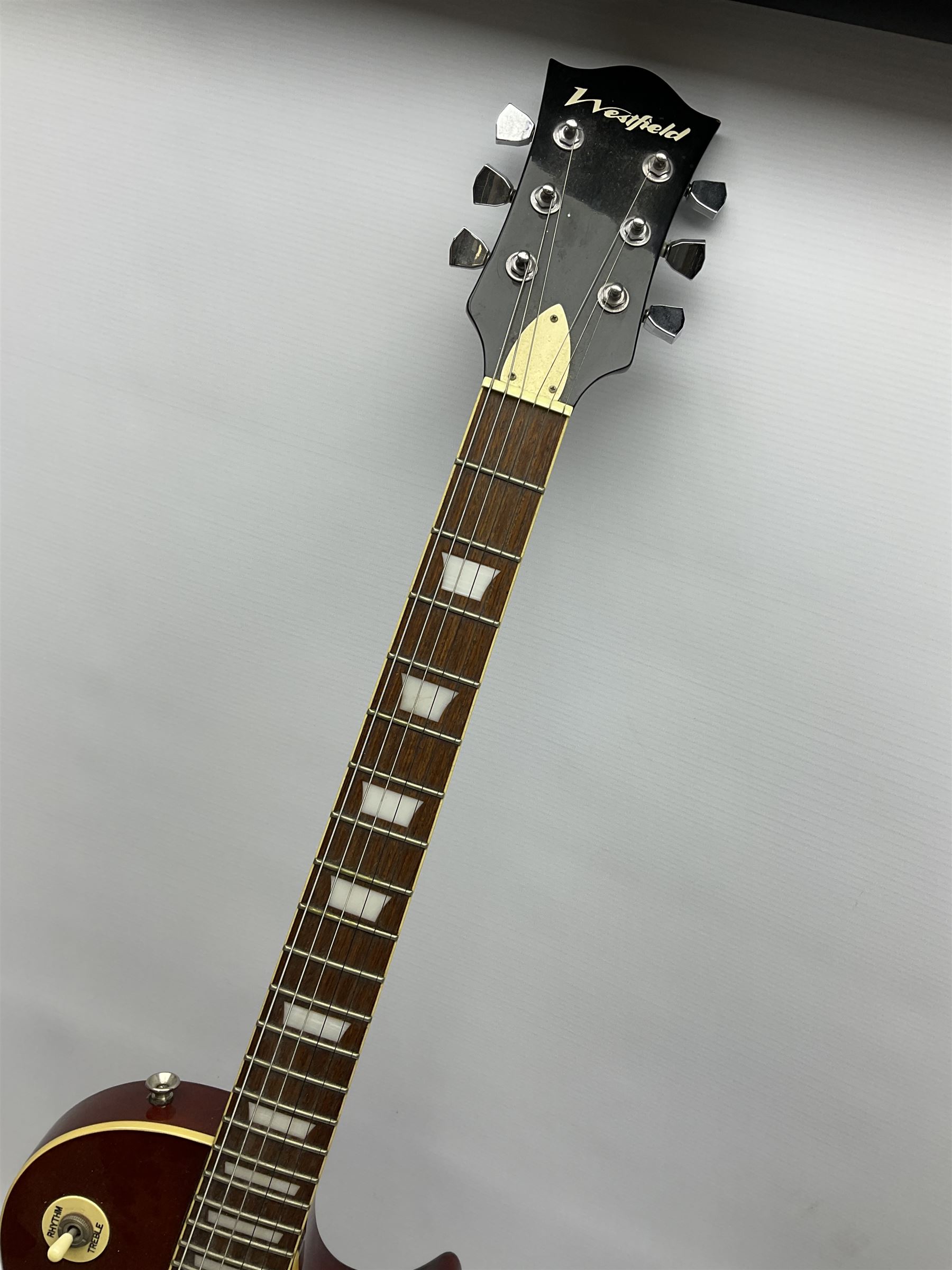 Westfield sunburst Les Paul style six-string electric guitar with ivory coloured trim L101cm; with Sunn ST-15 amplifier, serial no.VK-112435 (2)