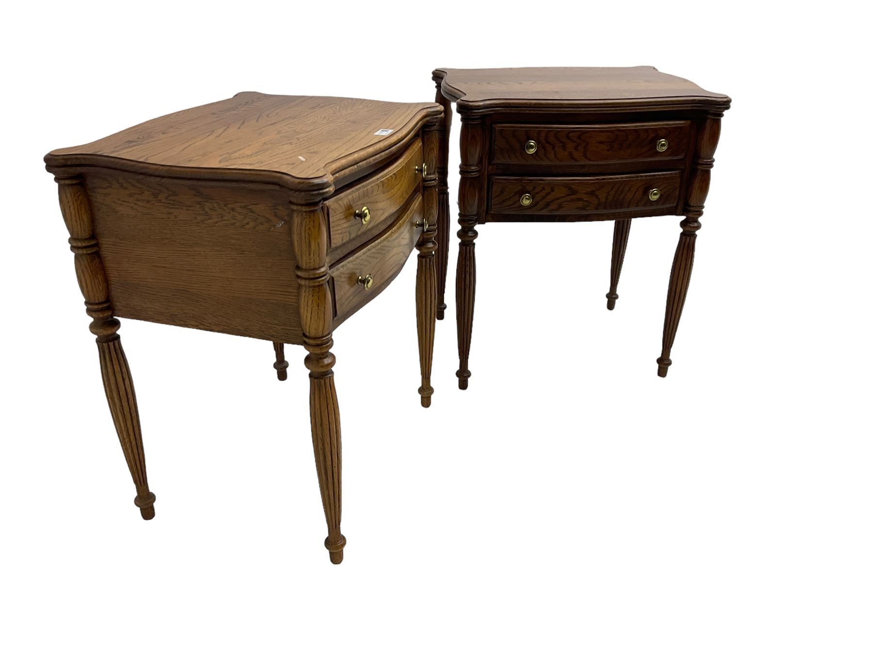 Lexington Furniture - pair of oak bedside lamp tables, shaped moulded top over two drawers, on turned and reed moulded supports
