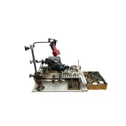 Boley watchmakers lathe with collet chuck, tool rest and tailstock, mounted on a wooden base with motor, lamp, binoculars, various collets and accessories including two dial gauges.