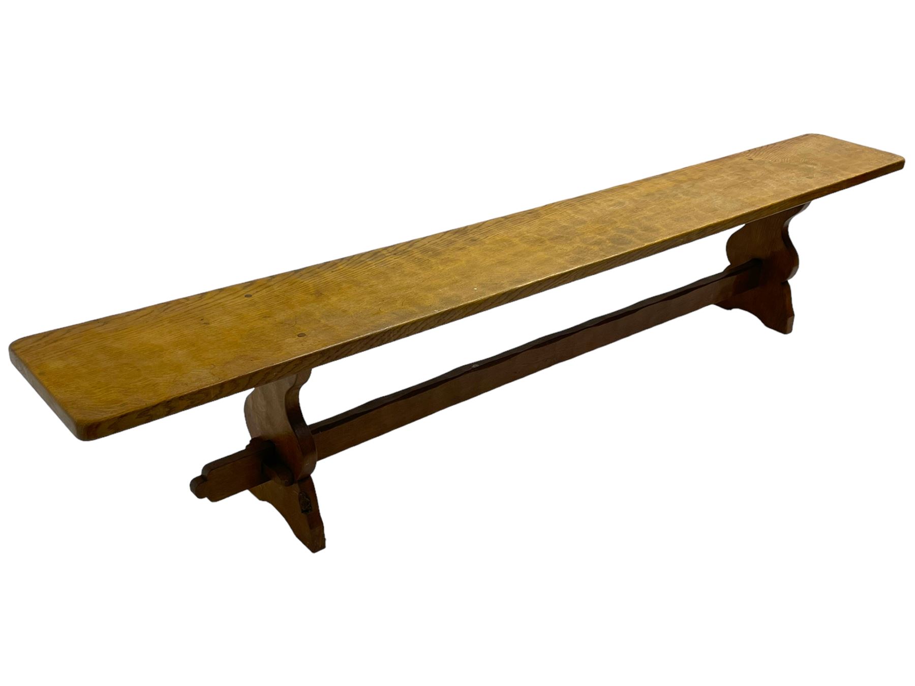 Gnomeman - adzed oak narrow bench, rectangular seat on shaped end supports united by pegged stretcher, carved with gnome signature, by Thomas Whittaker, Little Beck 