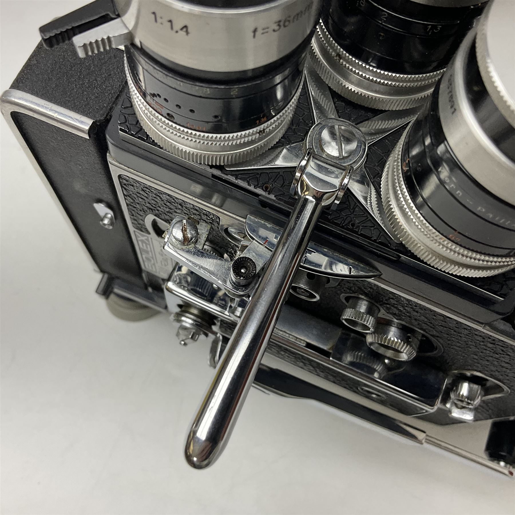 Paillard Bolex H8 RX4 cine camera body with turret for interchangeable lenses, serial no. 216071, with 'Macro Switar H8RX f1.4 36mm' lens, serial no.863406, 'Macro Switar H8RX f1.3 12.5mm' lens, serial no. 865770, 'Switar H8RX f1.6 5.5mm' lens, serial no. 937691 and RX fader, in fitted leather case