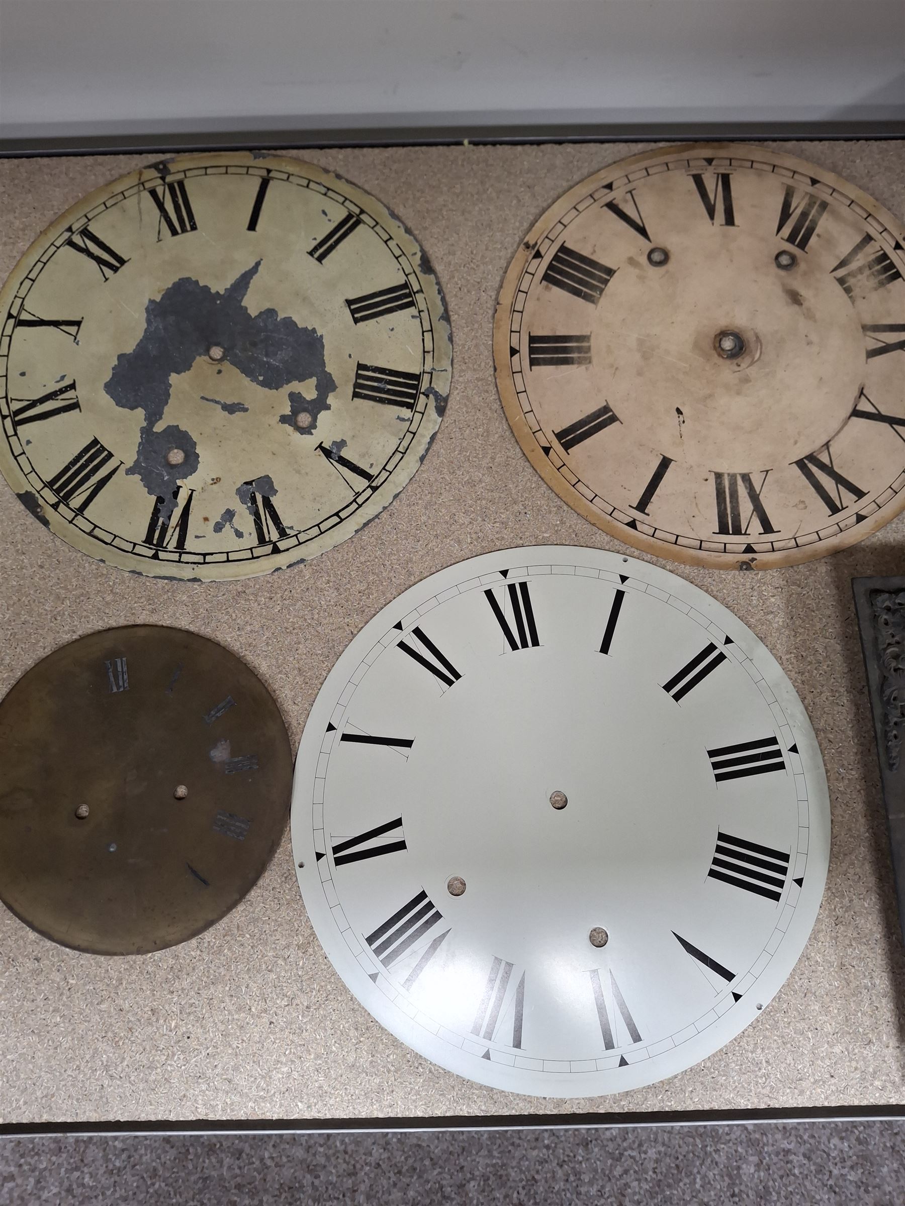 Approximately twenty-two longcase and wall clock dials, 18th century and later, included painted and brass examples