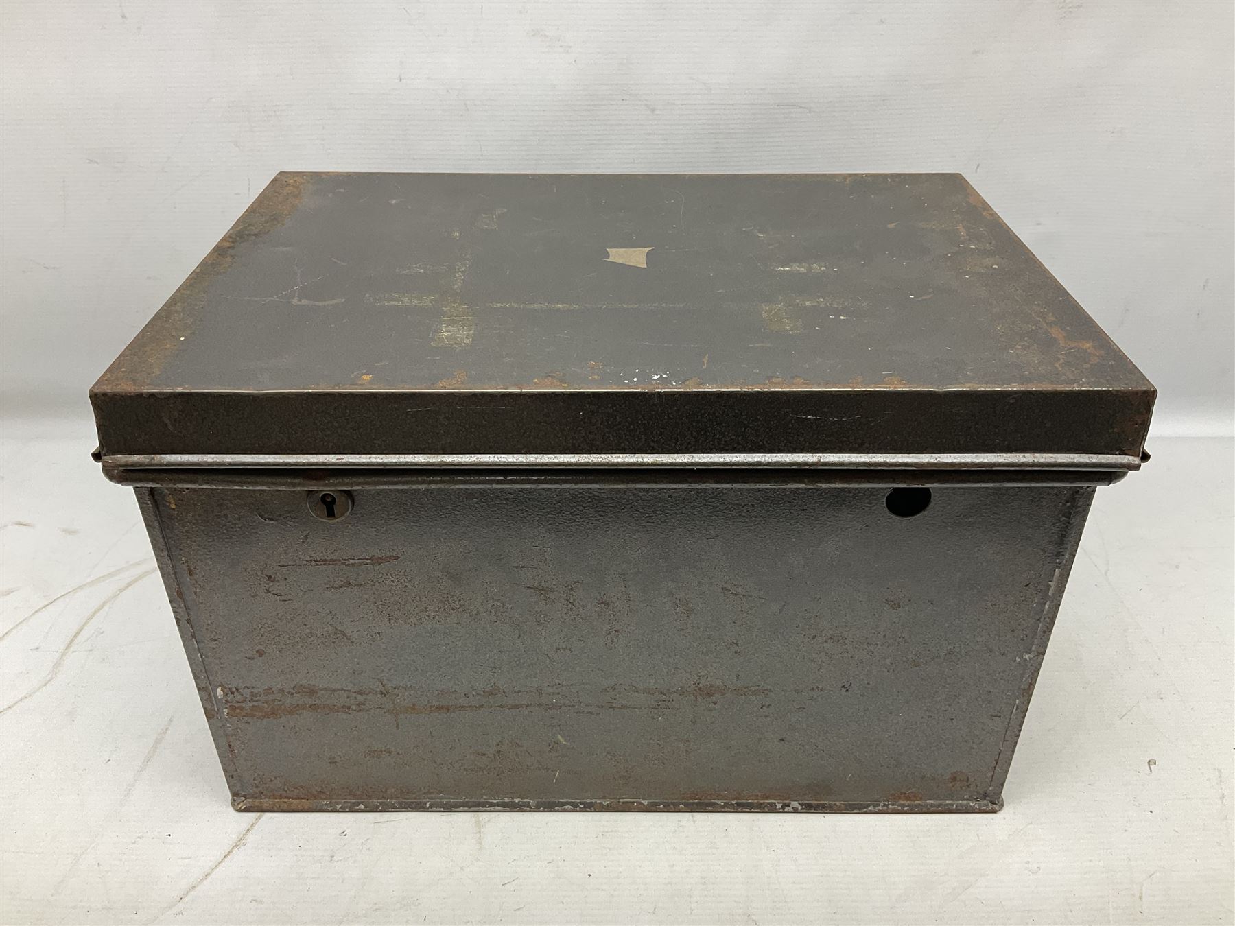 Assorted militaria including ten leather or canvas cartridge and other belts, maroon beret with 17th Lancers cap badge, modern bullet mould, leather and brass shot flask, two knives, shell cases, boomerang etc; in tin deed box