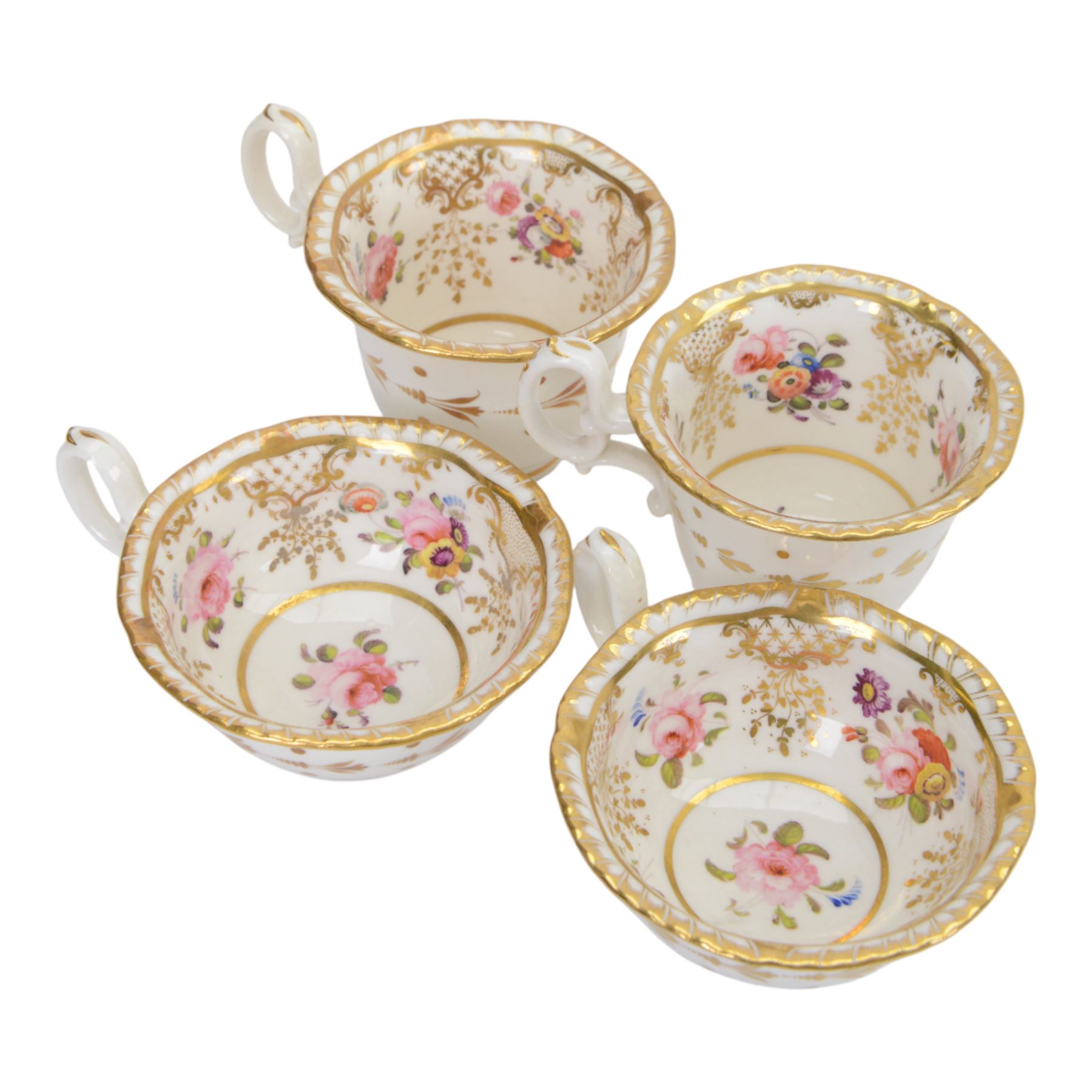 H&R Daniel, pair of trios, coffee cup, teacup and a saucer, circa 1826
pattern 4057, 'Second Gadroon Variation A', painted with fine foliate sprays and gilt hatched reserves, coffee cup including handle H8cm, saucer D14cm