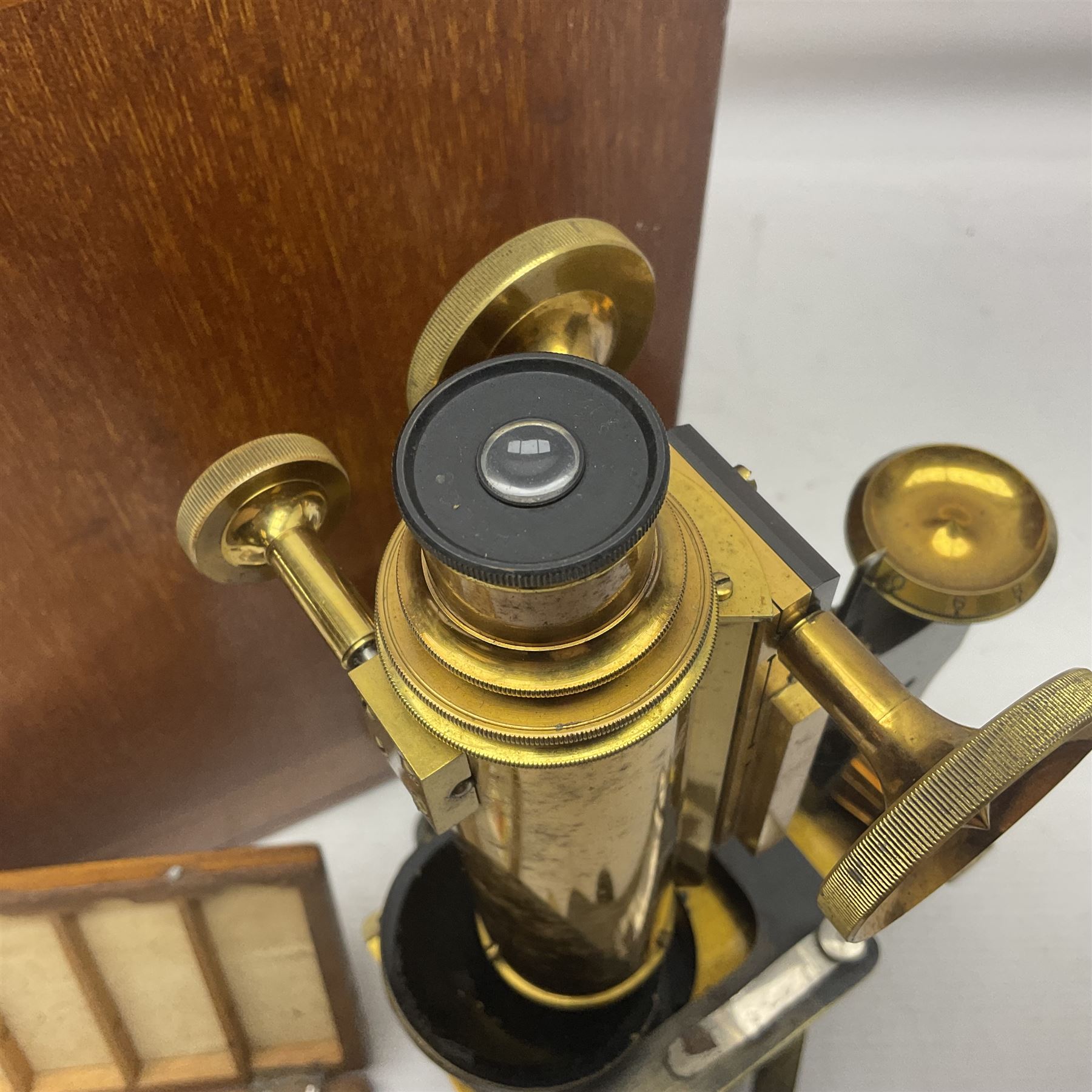 W. Watson & Sons Ltd lacquered brass compound microscope circa 1910, the back foot signed W. Watson & Sons Ltd, 313 High Holborn London and numbered 8193, together with a boxed collection of glass microscope biological sample slides