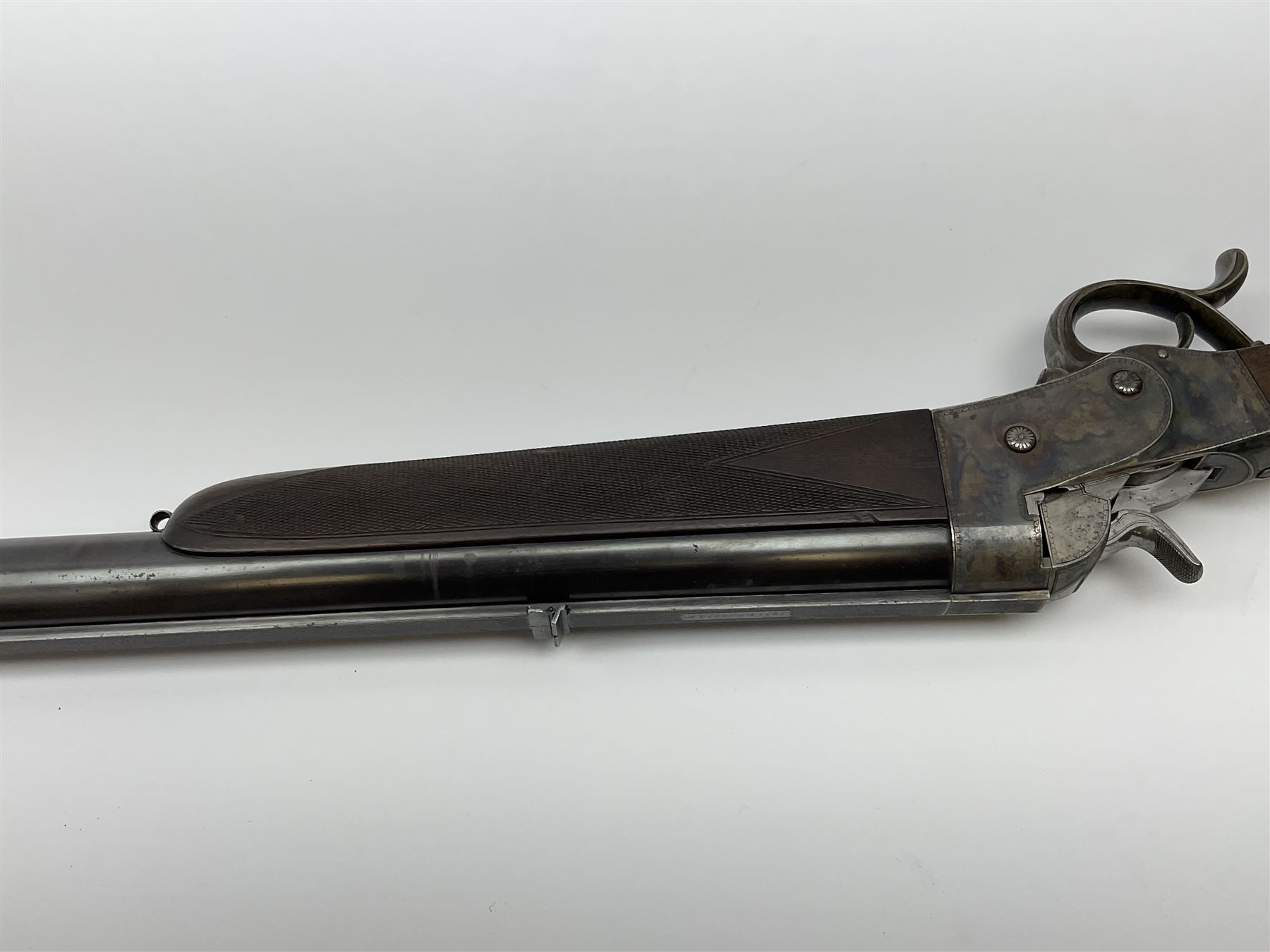Rare Henry Pieper Liege seven-chambered solid barrel 297/30 calibre rim-fire volley gun with six barrels around a central seventh barrel drilled for simultaneous fire, built on a Remington type rolling block action, blued 62cm barrel with raised rib and twin rear leaf sights, case hardened action complete with loading plate for seven cartridges, walnut stock with chequered pistol grip and fore-end and inset 'silver' cartouche with two Chinese type characters, no.256PLN, L109cm overall