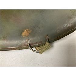 American first type paratrooper helmet with post-WW2 strap and D-rings and later 1944 liner bearing Firestone Tyre and Rubber Company mark; green textured finish