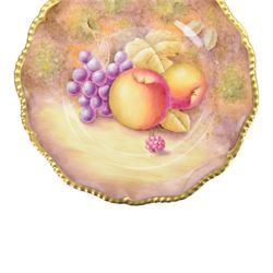 20th century Royal Worcester footed bowl, hand painted with gilt interior, the exterior a still life of fruit upon a mossy ground, signed Freeman, with black printed mark beneath, together with plate side plate and cabinet plate, bowl, H8cm, D13cm
