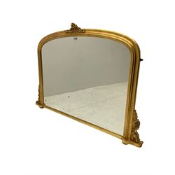 Victorian design gilt overmantel mirror, moulded arched frame with scrolled foliage cartouche pediment and brackets 