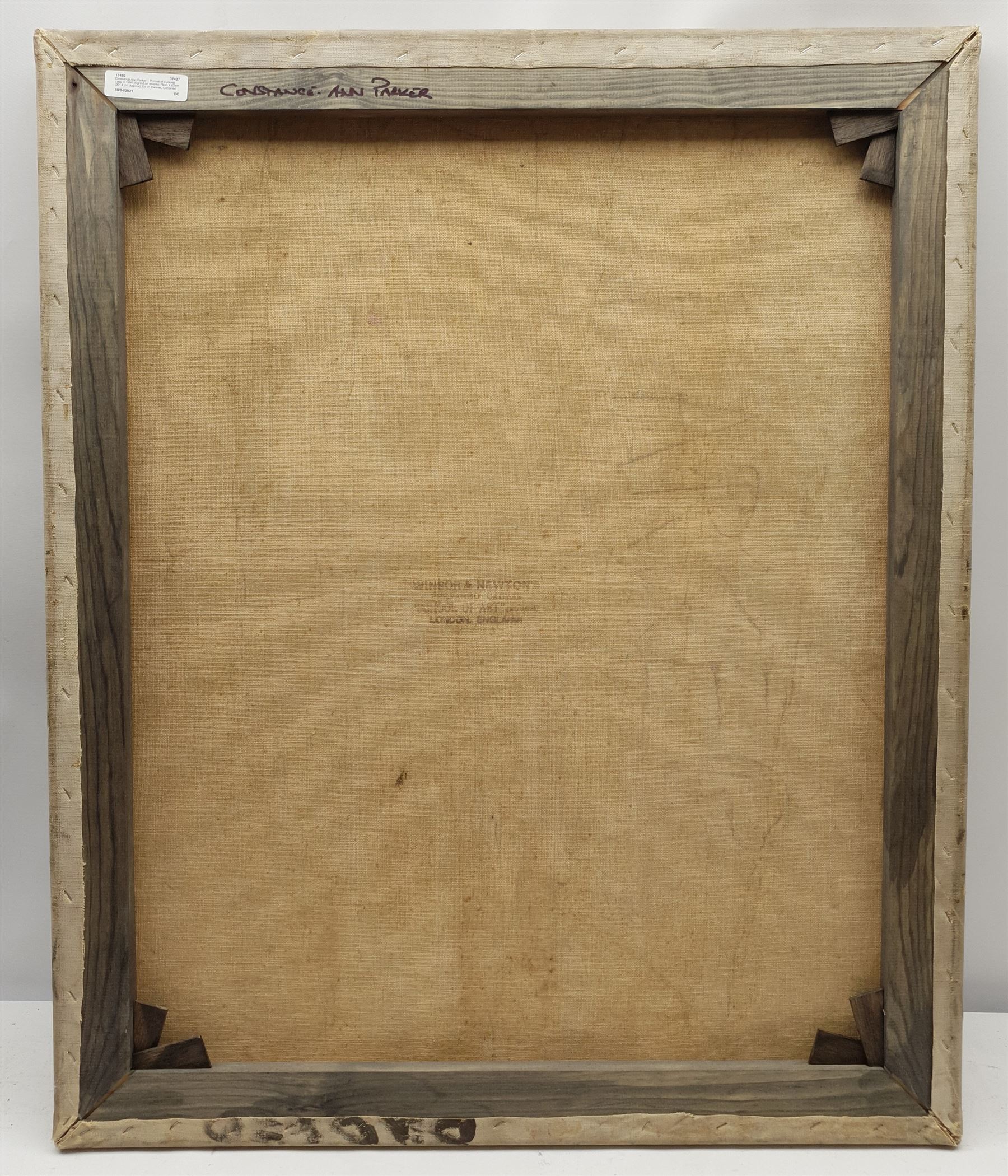 Constance Anne Parker (British 1921-2016): Young Lady at her Bedside, oil on canvas signed verso 76cm x 62cm