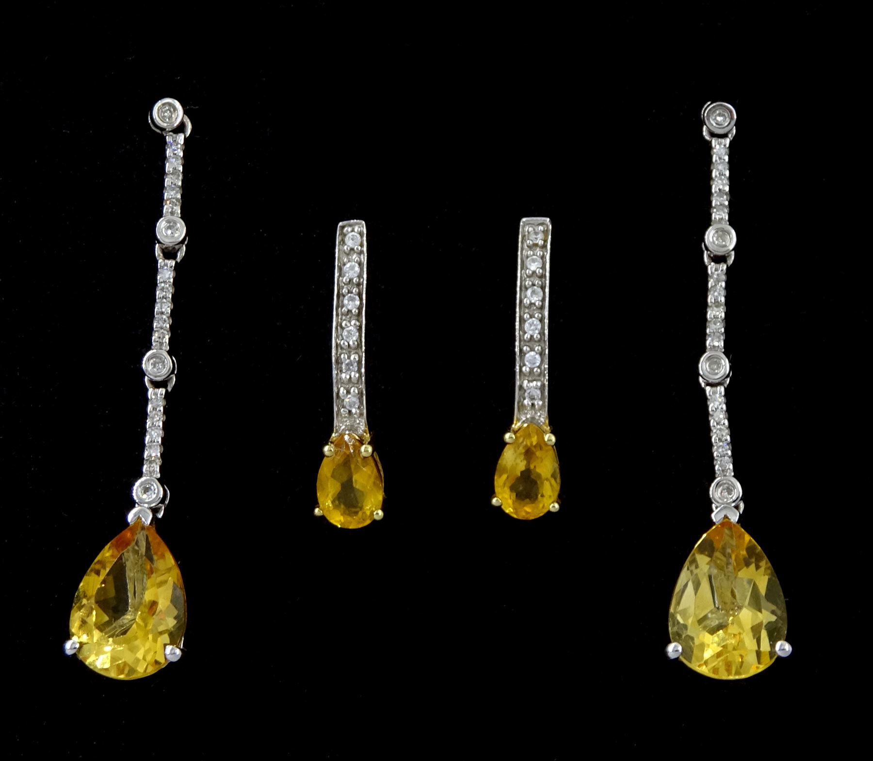 Pair of 9ct white gold pear shaped citrine and diamond pendant stud earrings, stamped 375 and a smaller pair of yellow gold citrine and cubic zirconia pendant stud earrings, stamped 10K