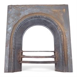 Two cast iron fire surrounds / inserts along with four metal surround pieces 
