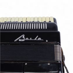 Bai-Le-20th century Chinese Piano Accordion, three octave keyboard with 96 treble buttons and 7 base keys, 16-fold bellows with shoulder straps and hard carrying case.