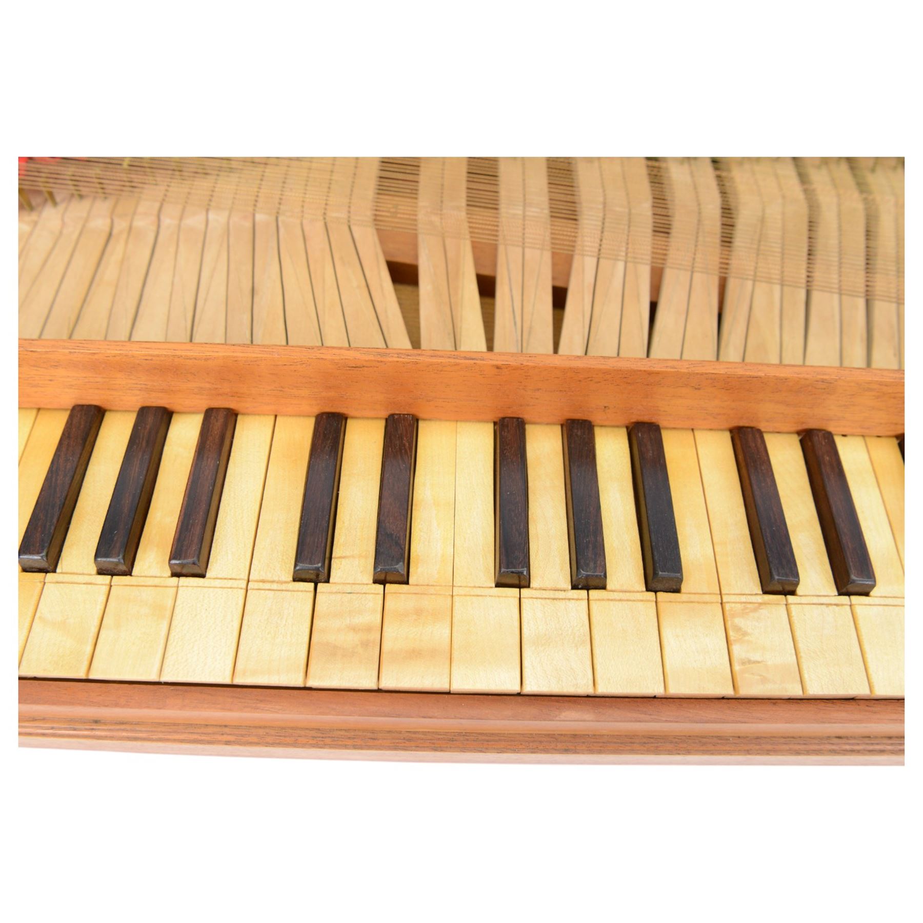 Tabletop Clavichord - From the Renaissance Workshop Company (Early Music Shop), modelled on an original table top instrument c.1740 in Gemeentemuseum, Den Haag.
Double fretted instrument, with a 53 keys, possibly in rosewood and boxwood, compass 4.1/3 ocatave C - e, with tuning key. 