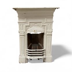 Two Victorian small cast iron fireplaces in a white finish