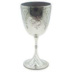 Victorian silver goblet, the cup and circular spreading foot with chased decoration, hallmarked H J Lias & Son, London 1873, H19.5cm, approximate weight 6.84 ozt (213 grams)