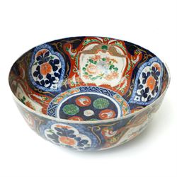 Late 19th/Early 20th century Japanese Imari bowl decorated with panels of flowers in blue, orange and green etc D27cm, Imari vase H24cm and a small ginger jar (3)