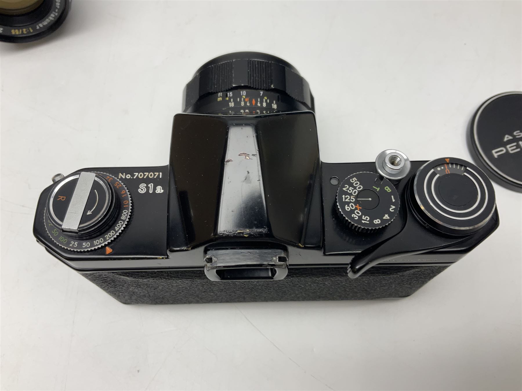 Asahi Pentax S1a camera body, serial no. 707071, with 'Super-Takumar 1:1.8/55' lens, serial no 2124044, together with Asahi Pentax Sv camera body, no. 1925617 with 'Super-Takumar 1:2/55' lens, serial no. 2770153, Asahi Pentax Meter, 'Super-Takumar 1:3.5/28' lens, serial no. 2075492 and 'Super-Takumar 1:4/150' lens, serial no. 1461613  