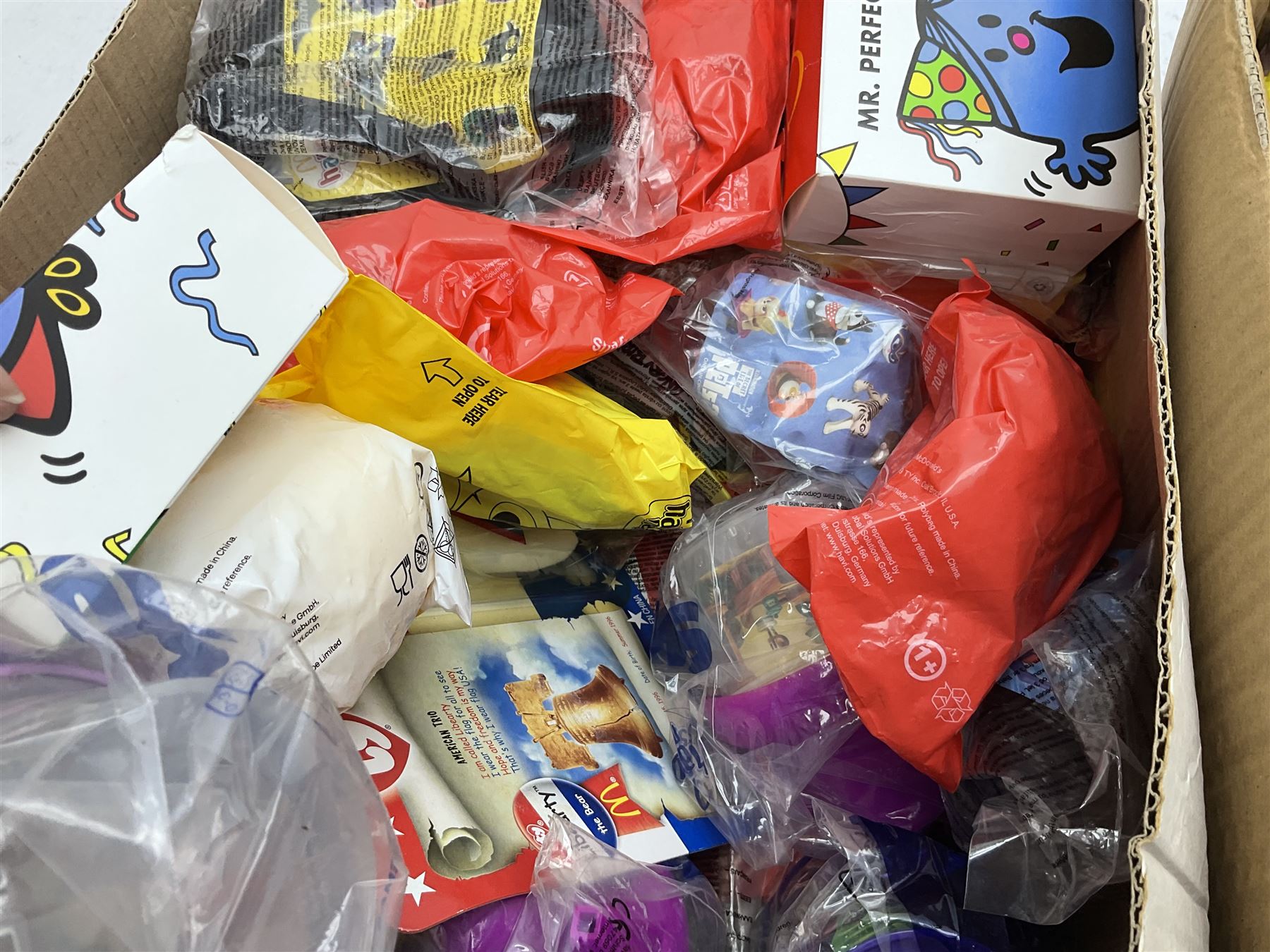 Two boxes of Mcdonalds memorabilia and merchandise