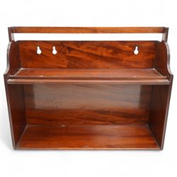 Mahogany two-tier book carrier, of rectangular section, with a single carrying handle over a shaped gallery 