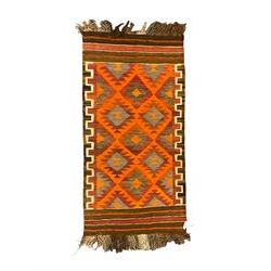 Turkish Kilim amber ground rug, field decorated with all over lozenges, geometric border and striped ends