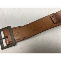 Mundial Brazil bowie knife, the 15.5cm steel blade inscribed 'Sheriff Knife', with banded and aluminium hilt; in leather sheath L29cm overall; British Army felt covered metal water bottle with webbing strap; leather 12-bore cartridge belt; and small pair of non-military binoculars in part case (4)