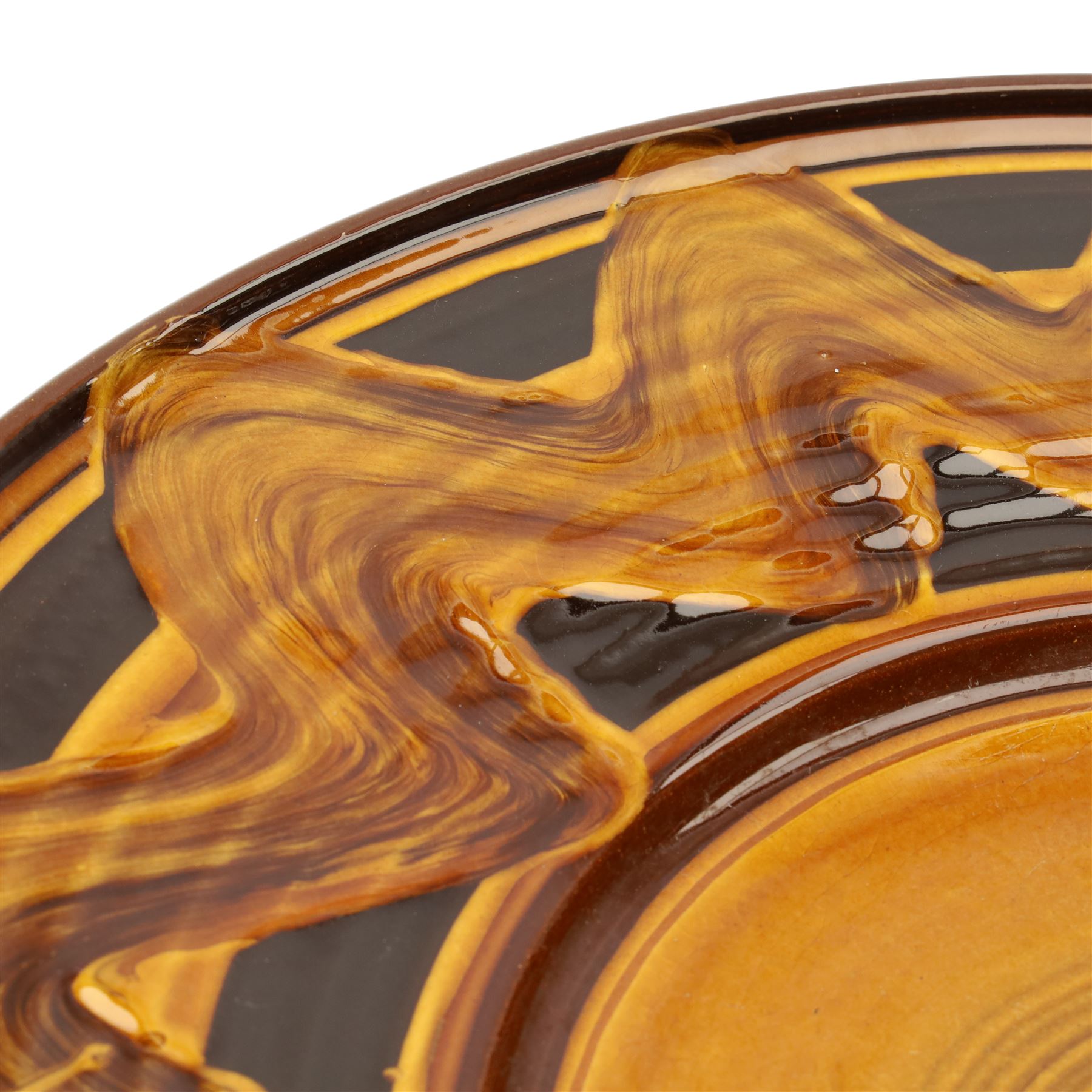 Clive Bowen (1943-): Large slipware charger, in black and orange glazes, unmarked D50cm