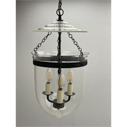 Vaughan Designs - Regency design bronzed metal and glass hall lantern, three branch light in glass bell, the band decorated with bell flower garlands and serpentine mythical beast chain brackets