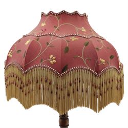 Early 20th century mahogany standard lamp, the turned column raised on a circular stepped base with compressed bun feet, fitted with a shaped Downton Abbey silk shade decorated with foliate trail motifs, beaded edging and fringe trim