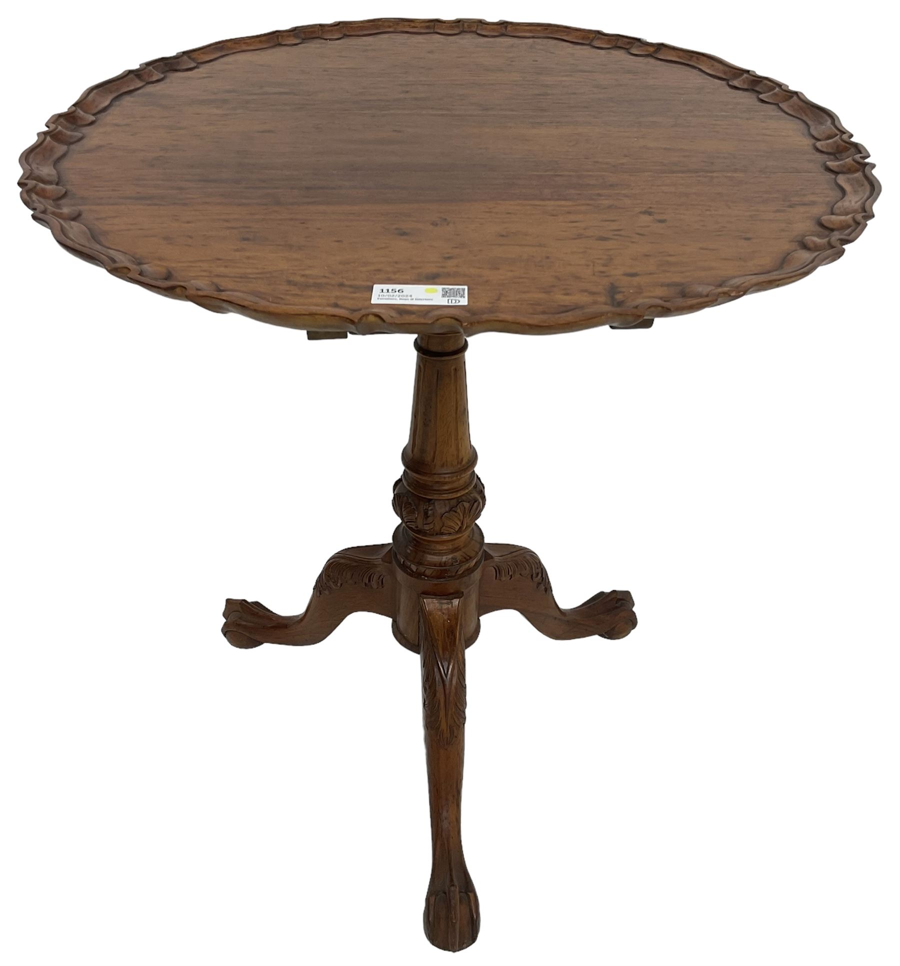 Georgian design hardwood tripod table, moulded pie-crust tilt-top, turned and fluted column carved with foliage, on three acanthus leaf carved splayed supports with ball and claw feet