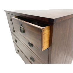 George III mahogany chest, the top with ebonised string inlay over two short and three long graduated cock beaded drawers with original plate brass pull handles, inlaid band to base, raised on bracket supports, retaining original blue paper lined drawers 