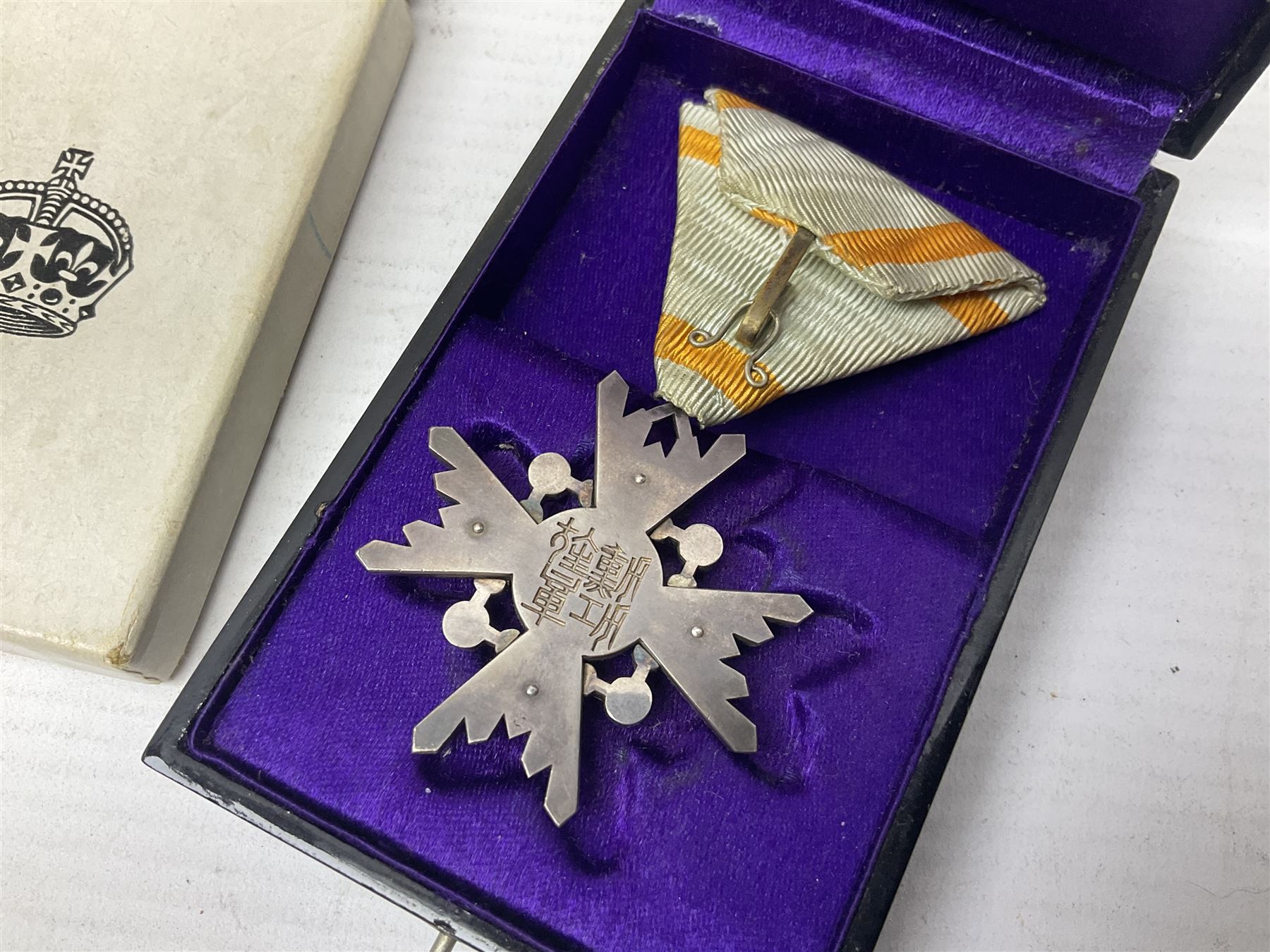Japanese Order of the Sacred Treasure Medal (Zaihosho) in lacquered box; Norwegian Grunnlovsdag 1945 Medal with National Flag ribbon; three school attendance medals; four Royalty commemorative medals including both Victoria jubilees; quantity of medal ribbons and medal bars; medal issue boxes; badges; booklets etc