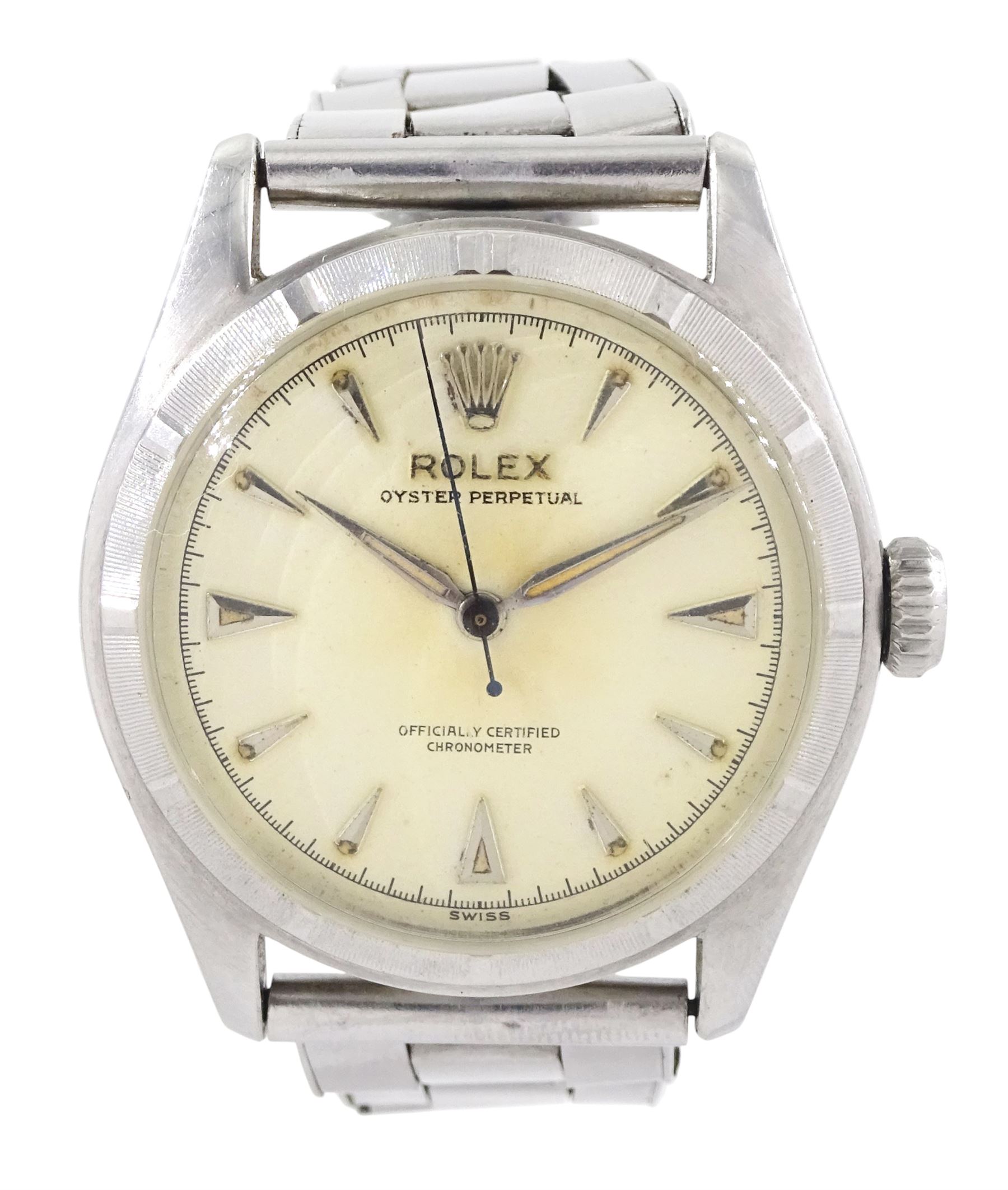 Rolex Oyster Perpetual gentleman's stainless steel automatic wristwatch, Ref. 6107, serial No. 804478, cream dial with dagger hour marks, on expanding Rolex bracelet, with fold-over clasp, with papers dated 1953 / 54