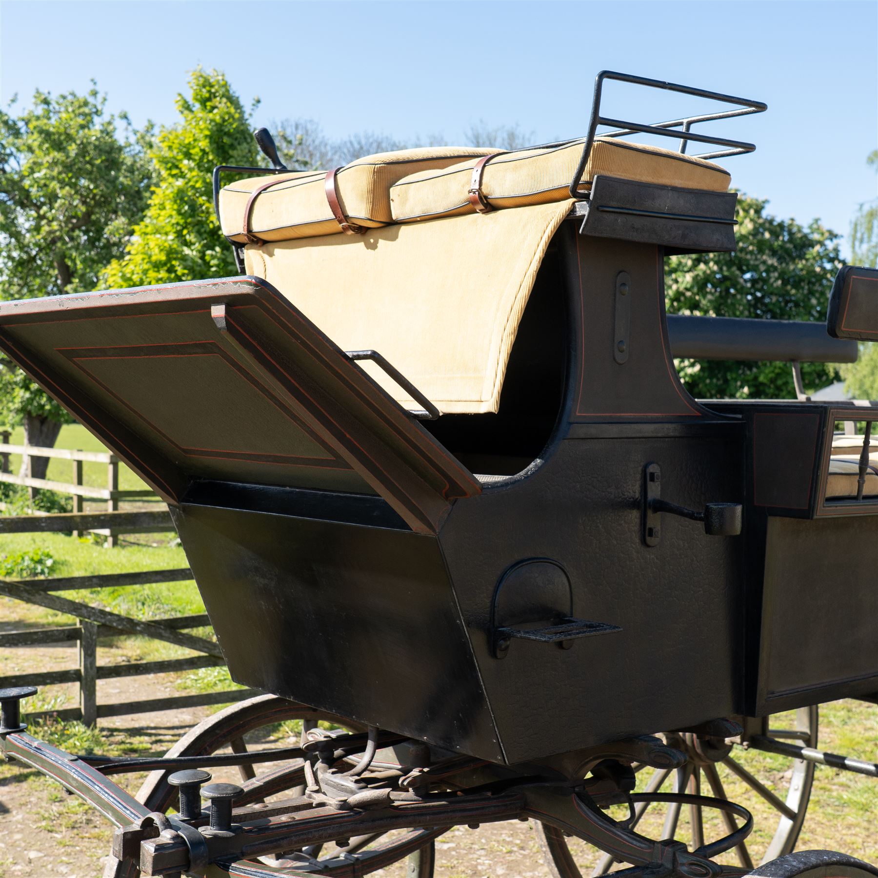 The Zetland Body Break by Peters & Sons, London

A fine and substantial late nineteenth century body break by Peters & Sons of London, circa 1880, formerly owned by the Marquis of Zetland. The carriage is finished in dark olive green and black with red, black and yellow lining, and is fitted with an elevated coachman’s box seat above a forward luggage compartment. The open rear body is entered by side doors and arranged with opposing longitudinal passenger seating.

The carriage is mounted on English pattern wooden artillery wheels with iron tyres and is carried on full elliptic springs, with a transverse helper spring behind. The front axle is fitted with fifth wheel turntable steering. The rear passenger compartment has upholstered longitudinal side benches beneath padded back rails, with turned spindle upper panels to the side doors and rear handrails. The driver’s seat is upholstered in corded fabric and secured with leather retaining straps.

Details include shaped splinter bar and turntable, folding rear step below the door with leather covered interior handle, luggage rails to either side, pole fittings for use with a pair or team of horses, and a handbrake with brake blocks operating to both rear wheels. The wheel hubs are fitted with polished hub caps engraved “Peters & Sons, London”. The exterior retains small Zetland family crests to the side panels.

The carriage has been conserved by Woods of Fairbourne Carriages Ltd and is recorded as Lot 146 in The George Shaw Collection sale, 5 November 2003, where it was catalogued as The Zetland Body Break and described as having previously been owned by the Marquis of Zetland.

Features
• Peters & Sons, London coachbuilder’s hub caps
• Known as The Zetland Body Break
• Formerly owned by the Marquis of Zetland
• Circa 1880
• Conserved by Woods of Fairbourne Carriages
• Dark olive green and black bodywork with red, black and yellow lining
• Elevated coachman’s box seat
• Forward luggage compartment
• Open rear passenger body with side doors
• Opposing longitudinal passenger seating
• Turned spindle upper panels to the side doors
• Folding rear step with leather covered interior handle
• Full elliptic spring suspension with transverse helper spring behind
• Fifth wheel turntable steering
• Handbrake with brake blocks operating to both rear wheels
• Wooden artillery pattern wheels with iron tyres
• Shaped splinter bar and pole fittings for a pair or team of horses
• Small Zetland family crests to the side panels

Provenance
The George Shaw Collection, 5 November 2003, Lot 146. Previously owned by the Marquis of Zetland.

Conservation

Conserved by Woods of Fairbourne Carriages.

Dimensions:
Overall length: 310 cm
Width: 176 cm
Height: 226 cm

Front wheel diameter: 98 cm
Rear wheel diameter: 140 cm

Seating:
Driver's box seat: 2 persons

Rear passenger compartment: Two longitudinal benches accommodating approximately 8 to 10 passengers