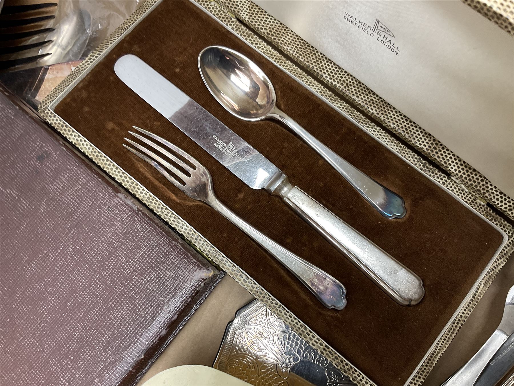 Set of four hallmarked silver teaspoons modelled on spoons from the Roman Imperial period, silver fork, and quantity of silver plated and other cutlery to include Walker & Hall, in two boxes