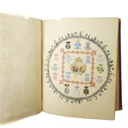 Victorian scrap book intricately worked with scraps heightened in watercolour with crests, military subjects and others on sixty five pages