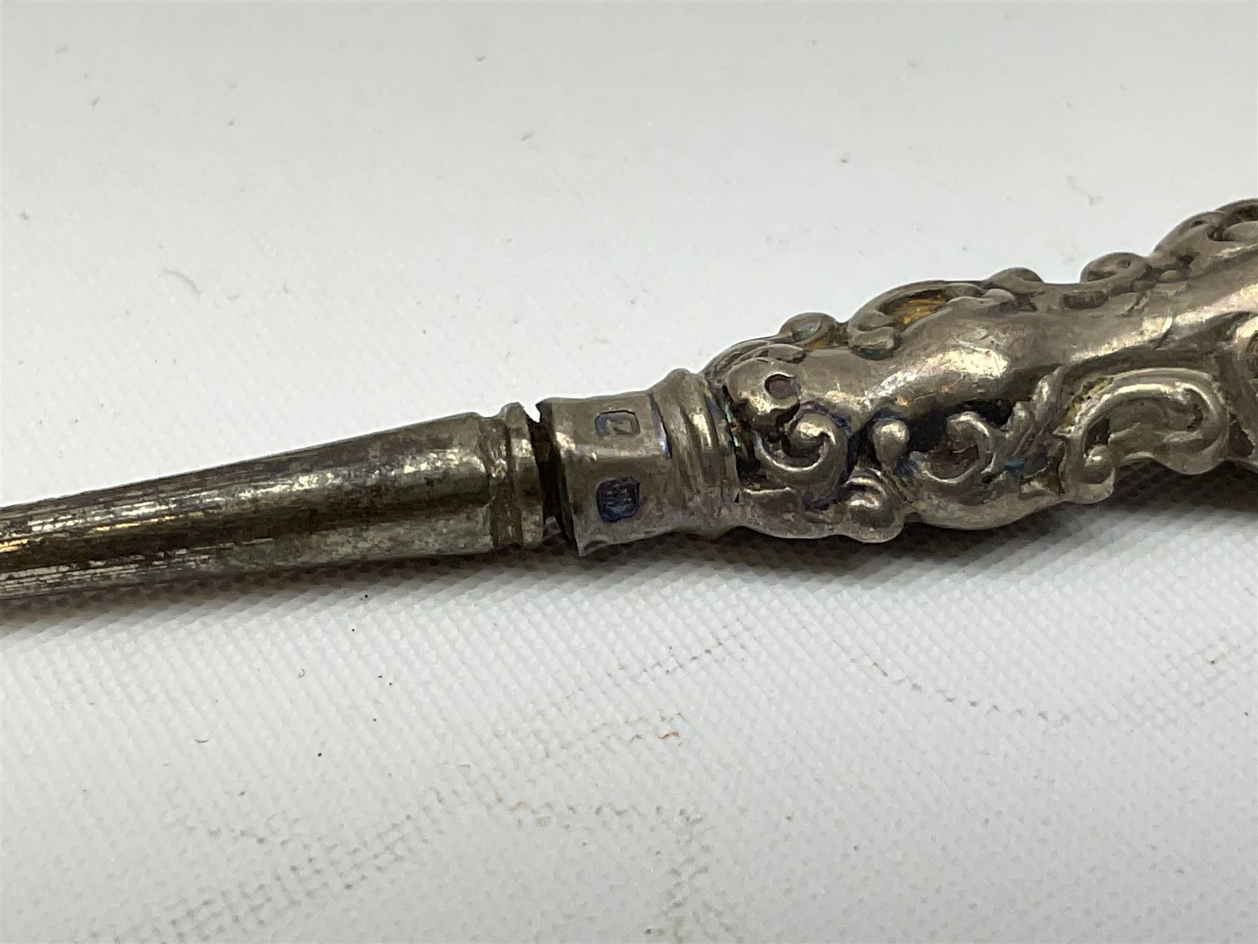 Small group of silver, to include Georgian Fiddle pattern teaspoon, later teaspoon, sugar tongs, etc., all hallmarked, approximate weighable silver 59 grams, approximate gross weight 113 grams
