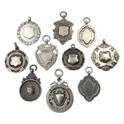 Ten early 20th century silver cartouche 